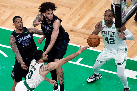 Jayson Tatum shoots against Dallas Mavericks